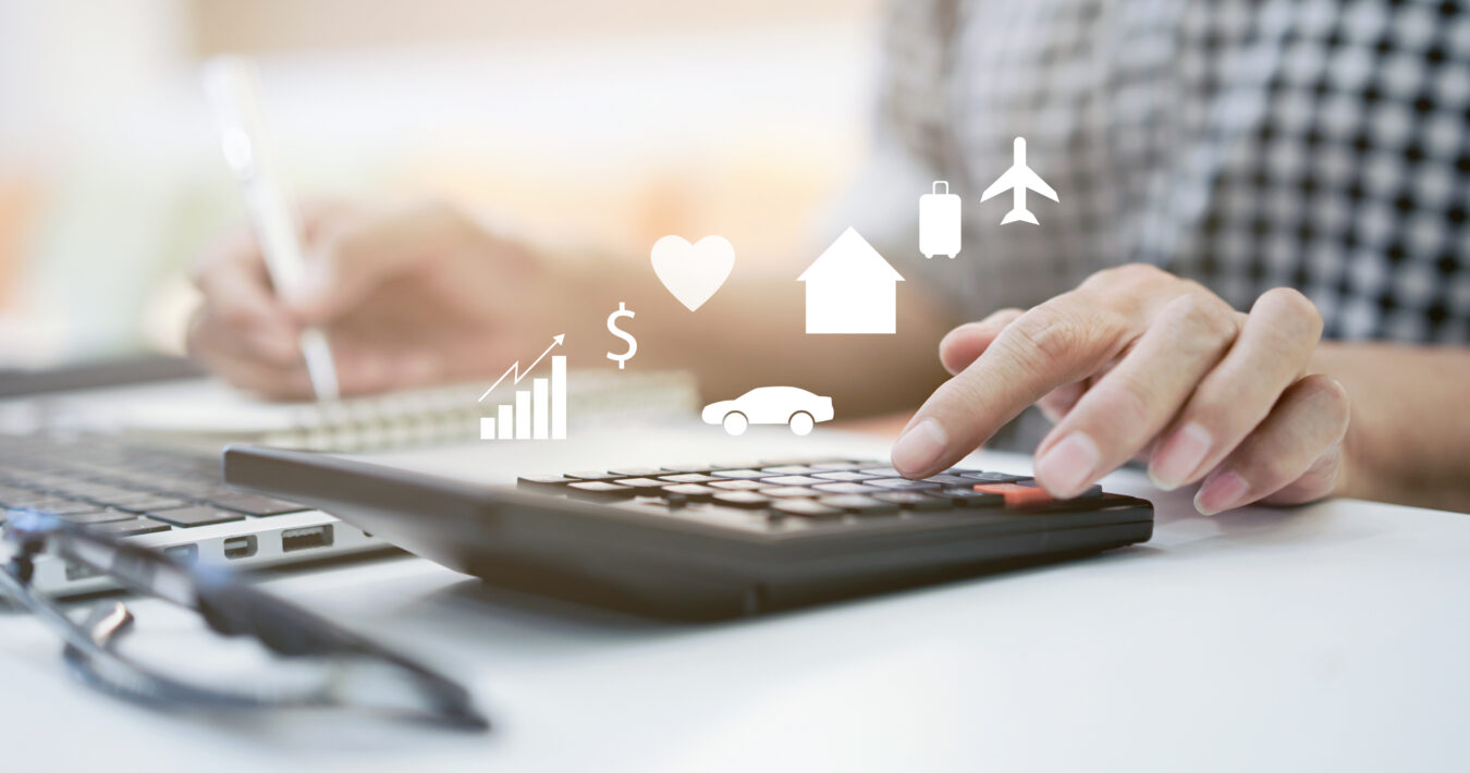 close up on mature woman pressing on calculator for making expense monthly and manage spending of life when retire such as home loan,insurance,savings,travel,health , lifestyle aged people concept